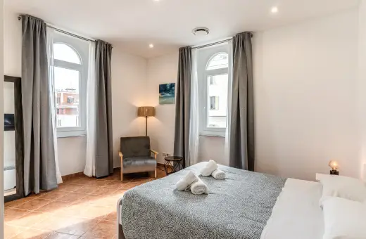 Camera matrimoniale Venere Apartments Roma - affitto breve elegante con vista su Roma centro.
